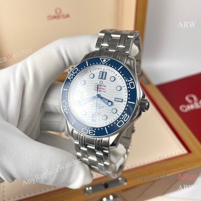 High Quality Replica OMEGA Seamaster 300 Different Straps (316 Stainless Steel/Silicone) White Wavy Ceramic Face Dial Blue Ceramic Bezel Stainless Steel Case Watch 42mm